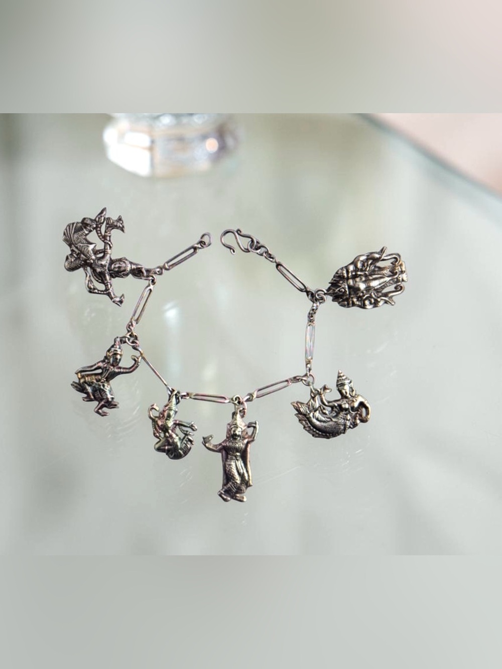 Super nice sterling silver vintage Thai charm bracelet.